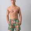 badeshorts_hellgruen_tropical print_vogel koralfarbe